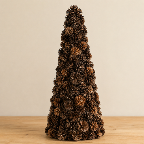 Ausable wreath company Decorative pinecone tree on a table with a beige background